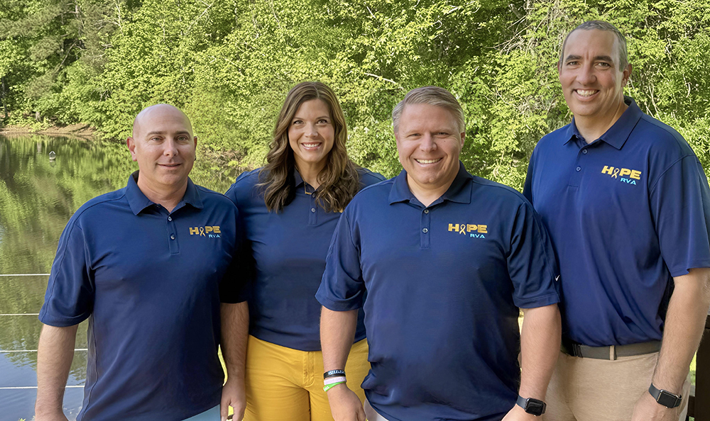 Members of the Board for HopeRVA in a group wearing blue polos
